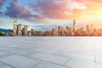 Obraz premium Empty square floor and cityscape with buildings in Chongqing at sunset,China.