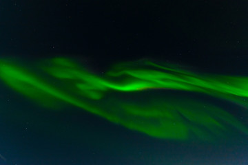 Northern lights, aurora in the sky at night.Horizontal .