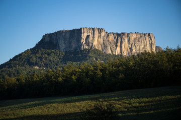 The stone of Bismantova, an isolated impressive spur in the italian appenines region. Morning view. 