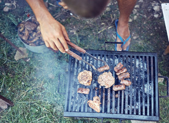 Barbecue making outdoors on a regular / vintage grill.
