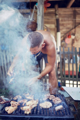 Barbecue making outdoors on a regular / vintage grill.