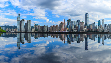 Chongqing skyline and modern urban skyscrapers with water reflection,China.