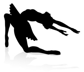 Ballet dancer in silhouette dancing in pose or position © Christos Georghiou