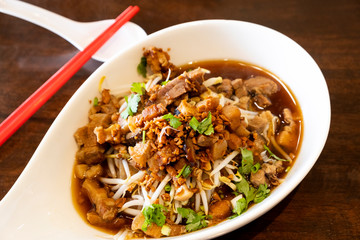 Chinese traditional tube noodles on a wooden table