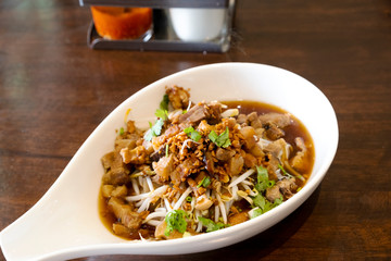 Chinese traditional tube noodles on a wooden table