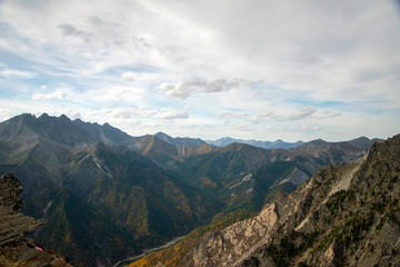  The mountain ranges of Satan and Hamar-Daban. Mountain peaks and valleys. Mountain landscape. The nature of Siberia.