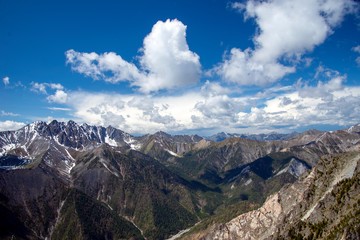  The mountain ranges of Satan and Hamar-Daban. Mountain peaks and valleys. Mountain landscape. The nature of Siberia.