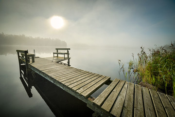 Wooden Swedish bridge at the morning light
