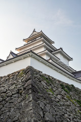 Looking up Wakamatsu Castle in Japan