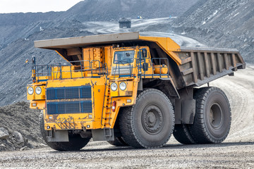 Quarry truck carries coal mined.