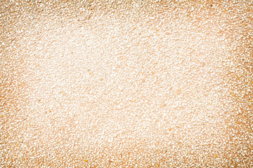 Brown exposed aggregate concrete wall texture dark stone background