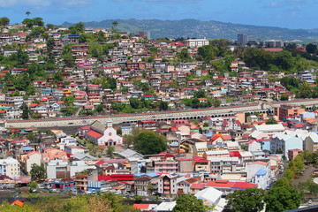 View at the colorful cityscape of Fort-de-France and the highway crossing the city (Martinique,...