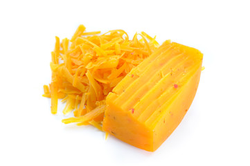 Chunk of Cheese and Pile of Grated Cheese Isolated on White
