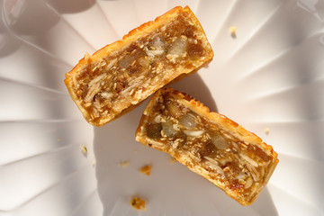 top view cut out traditional Chinese mooncake in a sunny morning