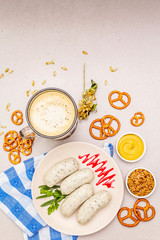 Oktoberfest set. Dark beer, weisswurst, pretzels, mustard, spikelets of grain, hop