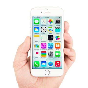 Apple iPhone displaying homescreen. The iPhone are smartphones running iOS developed by Apple Inc.