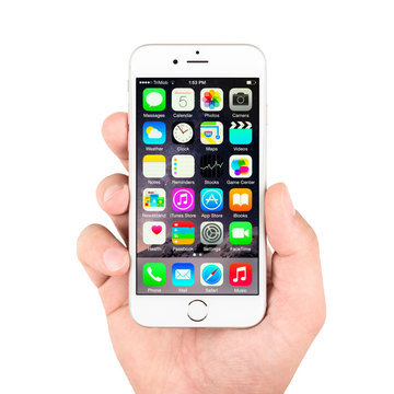 Apple iPhone displaying homescreen. The iPhone are smartphones running iOS developed by Apple Inc.