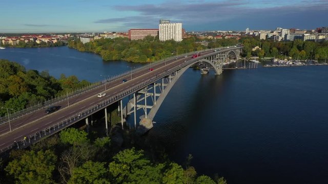 Aerial view of cyclists crossing bridge Vasterbron, Stockholm, Sweden.