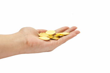 Fototapeta premium Hand holding gold coins isolated on white, A pile of Coins, investment concept, stack of gold, white background, pure gold, Saving, Coin stack growing business. Investment money concept.