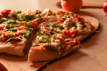cooked hot pizza at home kitchen