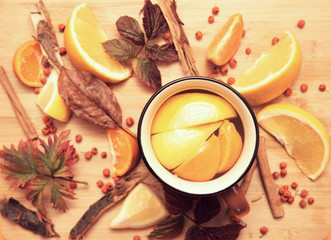 Cup of tea in the autumn decoration.