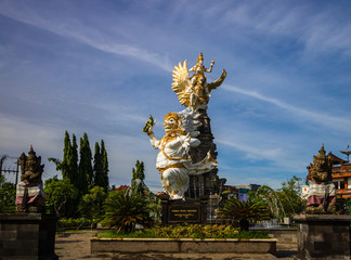Traditional Balinese demon guardian statue in Seminyak. Statue Taman Kota Gianyar or city park of Gianyar Regency. Bali, Indonezia, 2019.