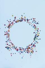 Festive and shiny background. Little stars on a light blue background.