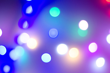 Multi-colored bokeh in neon colors. Good New Year spirit.