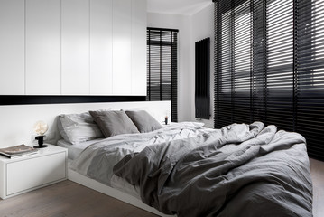 Designed bedroom with window wall