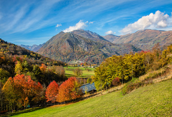 Beautiful autumn landscape in Pyrenees Mountains featuring in the distance The Arbizon Massif