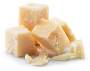 Parmesan cheese cubes isolated on white background.