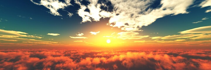 Beautiful sunset above the clouds. Panorama of clouds at sunrise.