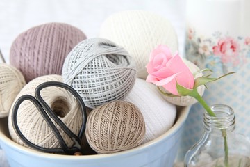 balls of yarn and needles