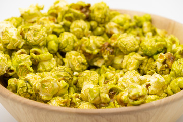 Japanese matcha green tea popcorn in the wooden bowl bulk