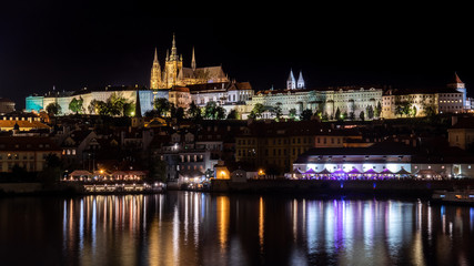 Night view of the Castle, Cathedral and Moldava River in Prague, Czech Republic.