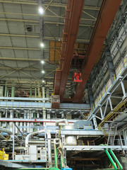 Industrial big water pumps with electric motors, pipes, tubes, equipment and steam turbine at power plant