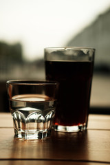 alternative coffee and a glass of water. close-up