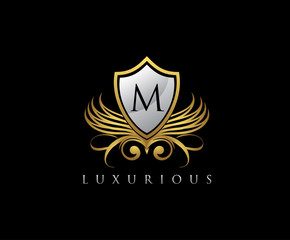 Luxury Gold Shield M Letter Logo Icon.