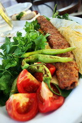 Turkish Kebab (Adana Kebab) on the dinner plate