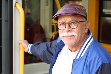 Senior Hispanic man using public transportation