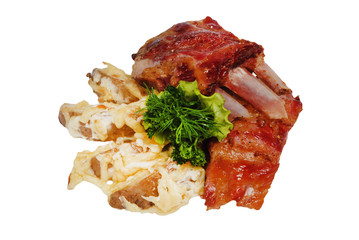 Fried rib steak with green on white isolated background