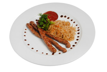 Raw pork sausages closeup view. Hunting grilled sausages and stewed cabbage on a plate isolated on white background