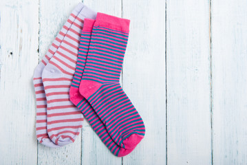 striped socks on white wooden