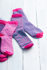 striped socks on white wooden