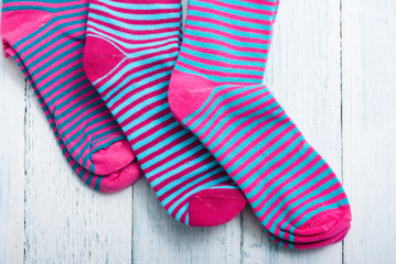 striped socks on white wooden
