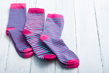 striped socks on white wooden
