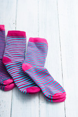 striped socks on white wooden