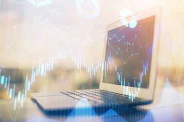 Forex Chart hologram on table with computer background. Double exposure. Concept of financial markets.