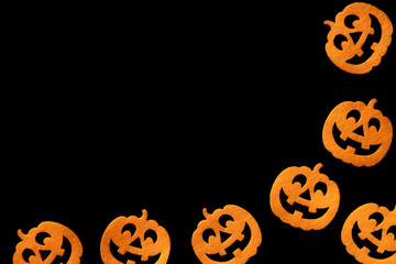 Halloween party. Scary orange pumpkin decoration isolated on bla