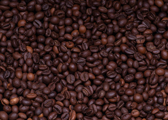 coffee beans on burlap background